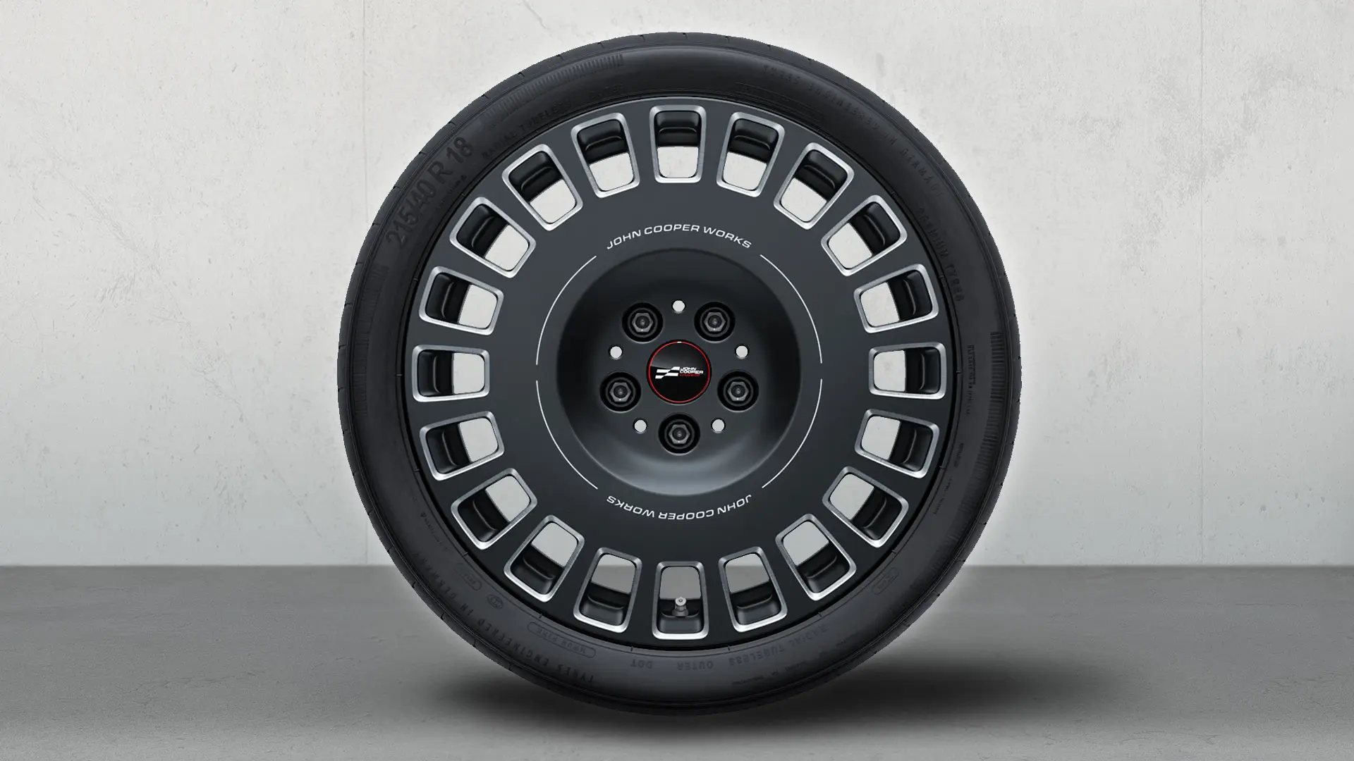 Koleso MINI JCW 18" Rallye Spoke 964 vo farbe Frozen Midnight Grey s diamantovo frézovanou povrchovou úpravou.